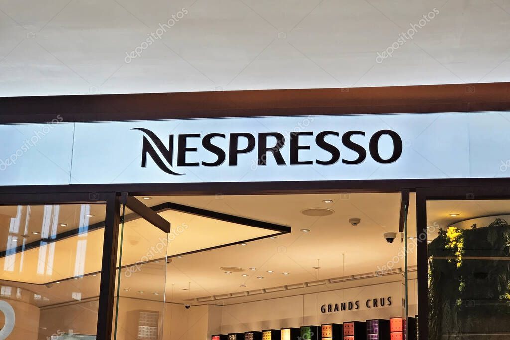 BANGKOK, THAILAND - AUGUST 17, 2023: NESPRESSO Sign. NESPRESSO is the world leader in coffee capsules, machines and coffee accessories that was founded in 1986.