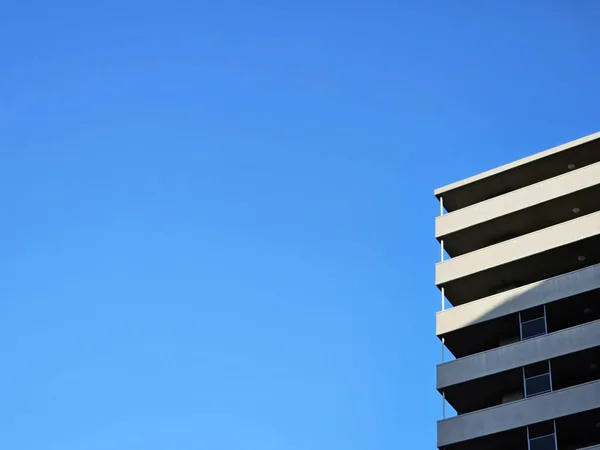 Minimal Building with Blue Sky Background.