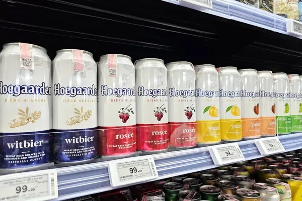 stock image Bangkok, Thailand - August 15, 2024: Hoegaarden beer on the shelf in the store. Hoegaarden Brewery is a brewery in Hoegaarden, Belgium, was founded in 1966.