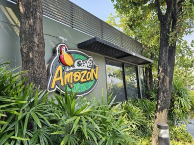 Bangkok, Thailand - January 23, 2025: Cafe Amazon sign. Cafe Amazon is a famous chain of Thai coffeehouses, was founded in 2002. clipart