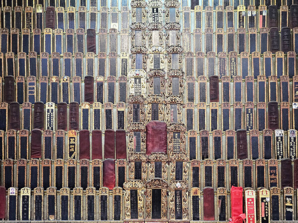 Chachoengsao, Thailand - March 28, 2025: Chinese spirit tablets at Luang Pho Sothon shrine where is a famous landmark of Chachoengsao province.