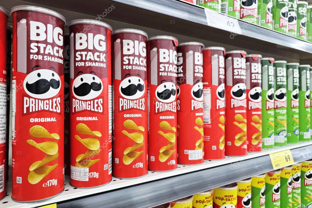 Bangkok, Thailand - August 19, 2025: Pringles Original on shelf. Pringles is an American brand of stackable potato-based chips invented by Procter & Gamble P and G in 1968.