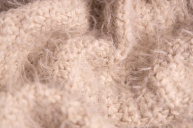 White knitwear texture. Soft texture of homemade cashmere wool sweater clipart