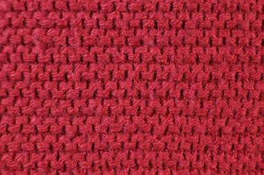 Kırmızı örülmüş kumaş dokusu arkaplanı