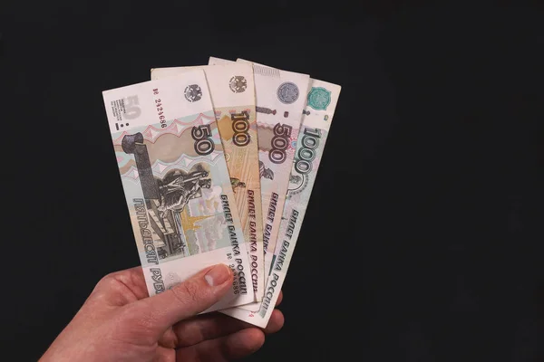 Руки Тримають Російські Банкноти Чорному Тлі — стокове фото