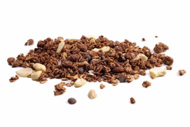 scattering of granola with oatmeal, nuts, fruits and chocolate isolated on white. The concept of healthy food, diet, weight loss.