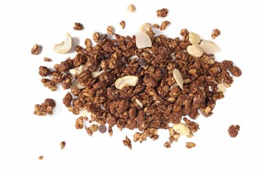 scattering of granola with oatmeal, nuts, fruits and chocolate isolated on white. The concept of healthy food, diet, weight loss.