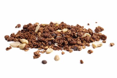 scattering of granola with oatmeal, nuts, fruits and chocolate isolated on white. The concept of healthy food, diet, weight loss.