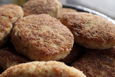 Fresh fried homemade cutlets or cutlets in a pan