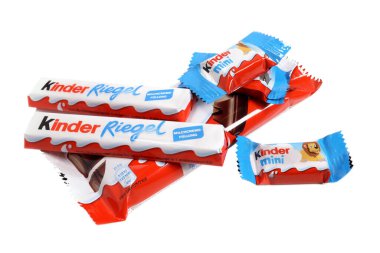 Magdalinovka, Ukraine - January 22, 2022. Chocolate bars and Kinder sweets from Ferrero isolated on white background