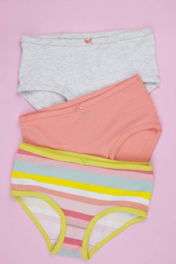 Baby underwear on a pink background