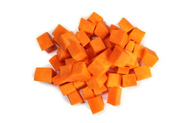 Sliced pumpkin chunks isolated on white