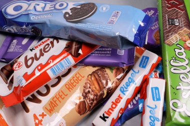 Magdalinovka, Ukraine - February 16, 2022. Chocolate products Milka, Kinder, Oreo and others