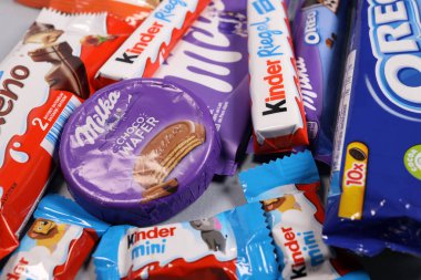 Magdalinovka, Ukraine - February 16, 2022. Chocolate products Milka, Kinder, Oreo and others