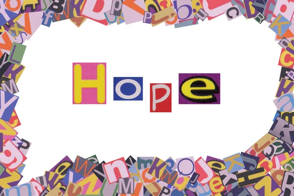 word hope from cut newspaper letters into a speech bubble from magazine letters