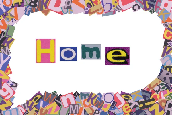 stock image word home from cut magazine colored letters
