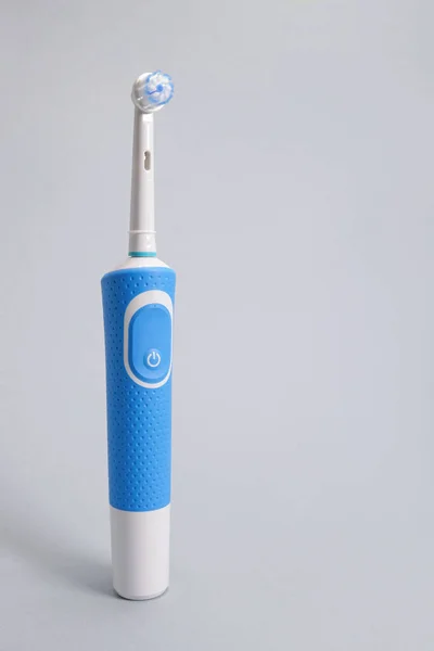 Modern Electric Toothbrush Gray Background Concept Oral Hygiene Dental Care — Stock Photo, Image