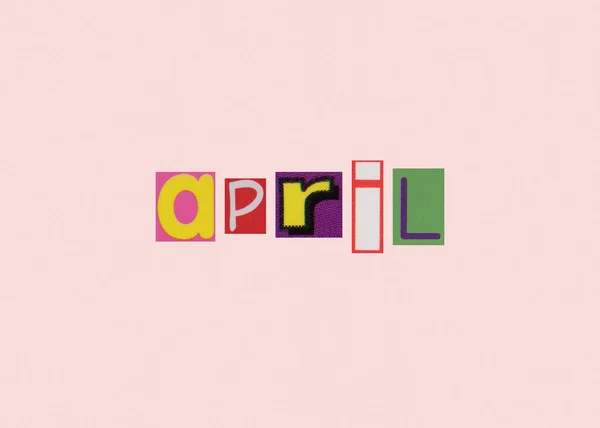 Açık Arkaplan Üzerine Kesilmiş Dergi Renkli Harflerden Nisan Kelimesi — Stok fotoğraf