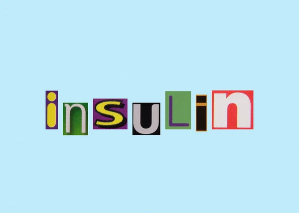 Insulin word from cut out magazine colored letters