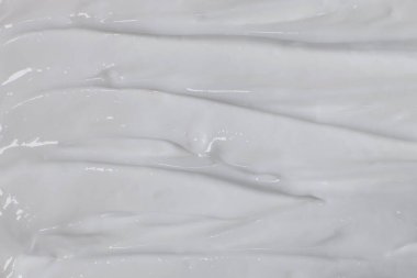 Vücut veya yüz bakımı için beyaz krem yakın plan, doku