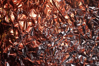 Sarı ışık, arkaplan veya dokuda buruşmuş alüminyum folyo