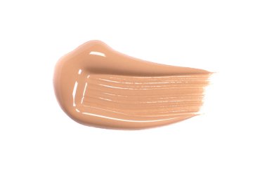 Makyaj temeli, kapatıcı ya da astar lekesi beyaza izole edilmiş.