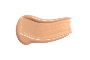 Makyaj temeli, kapatıcı ya da astar lekesi beyaza izole edilmiş.