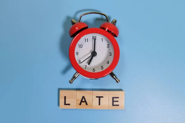 Word Late Alarm Clock Blue Background — Stock Photo, Image