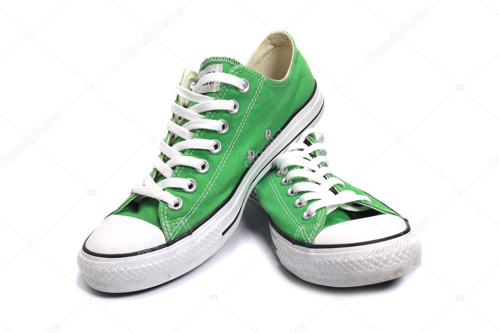 Magdalinovka, Ukraine - May 21, 2022. Converse All Star. Stylish shoes green sneakers isolated on white