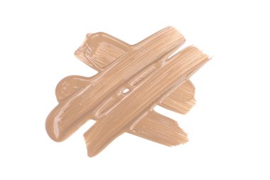 Lekeli bej temel kremi beyaza izole edilmiş.