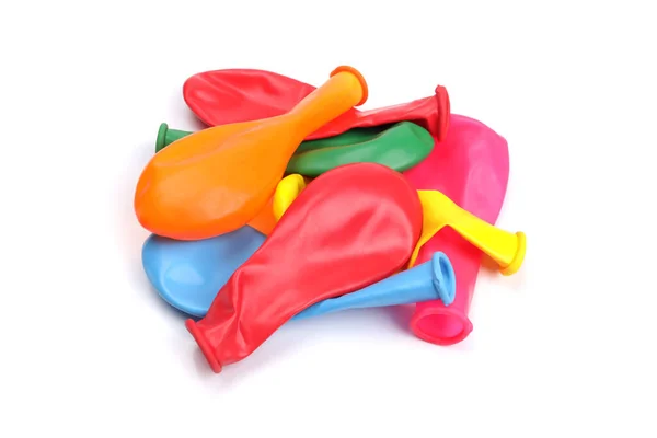 Ett Gäng Färgglada Oblåsta Ballonger Isolerade Vitt — Stockfoto