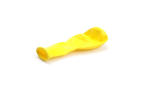 Balão Amarelo Não Soprado Isolado Branco — Fotografia de Stock
