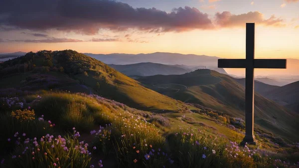 Religious Cross on the mountain at sunset. Landscape with flowers and a cross.