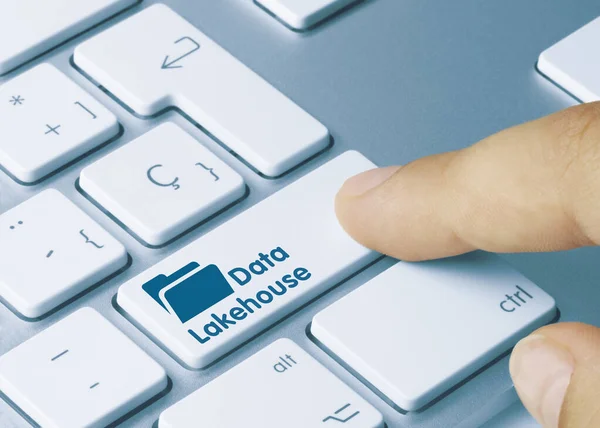 stock image Data Lakehouse Written on Blue Key of Metallic Keyboard. Finger pressing key.