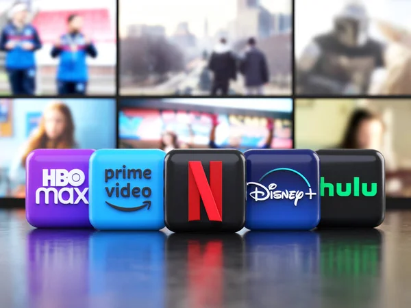 Valencia, İspanya - Mart 2023: TV ekranları önündeki ana yayın yapan film ve televizyon dizilerinin uygulama logoları, 3 boyutlu resimleme simgeleri. Netflix, Prime Video, Disney Plus, Hulu ve HBO Max