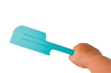 Beyaz arkaplanda pişirmek için mavi plastik spatula