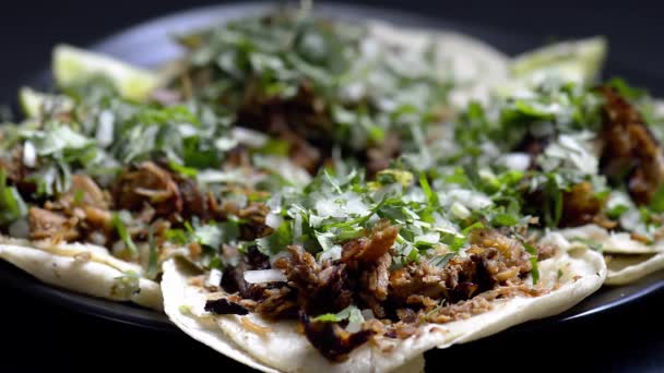 Video Green Salsa Verde Being Poured Mexican Carnitas Tacos Black — Stock Video