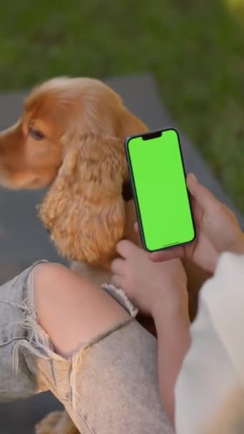 Young Woman Uses Phone Green Mock Screen Siting Lawn City — Stock Video