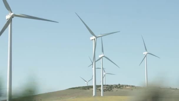 Wind Generators Spinning Operation Viewed Moving Car Travel — Vídeos de Stock