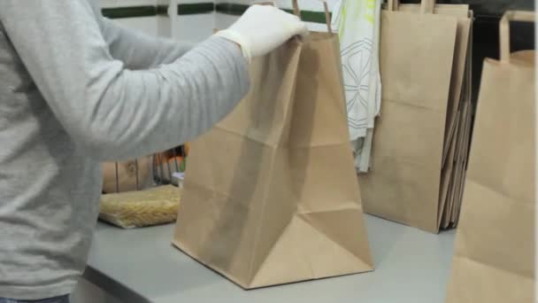 Putting Food Bags Distribute People Need Humanitarian Action Kitchen — Vídeo de stock