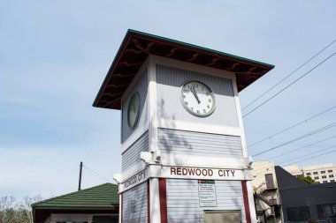 Historic style Redwood City clock tower at Caltrain station - Redwood City, California, USA - February 23, 2025 clipart