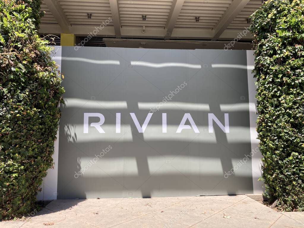 Rivian sign on showroom store facade exterior - Palo Alto, California, USA - May 27, 2025