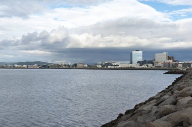 Atlantic Ocean view in part of Reykjavik with buildings along the coast