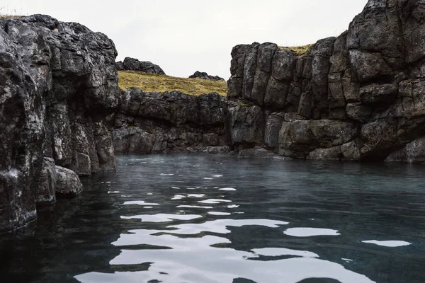 Sky Lagoon in Iceland. Geothermal spa with heated water on cold day