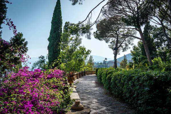 Villa comunale garden in Taormina. City park with landscaped gardens and picturesque views in Taormina, Sicily in Italy