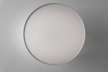 Yüzeyde kabartmalı yuvarlak gri şekil. Desenli arkaplan