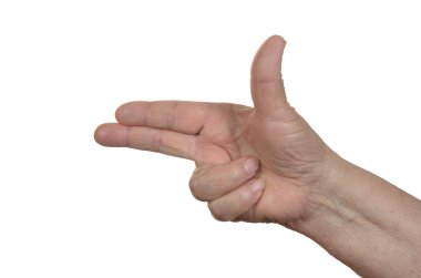 Bir sembol gösteren yaşlı bir kadının eli.