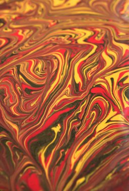 Bir sonbahar veya şeker teması için sarı ve kırmızı tonlarda dalga benzeri bir arkaplan