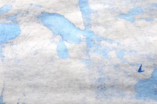  Beyaz kağıttaki mavi boya lekelerinin basit arkaplanı