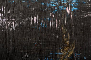 Renkli lekelerle çizilmiş siyah arkaplan